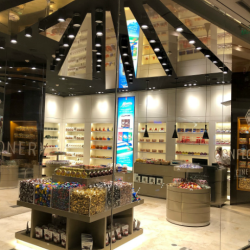 Diseño de locales comerciales en Shoppings – DOT – Confectionery Fine Foods- Ariaudo & Asoc